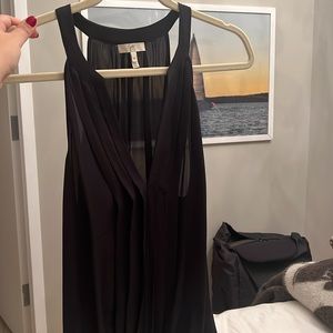Black, sleeveless Joie blouse. Flowy with hugged fit at waist. Mint condition.